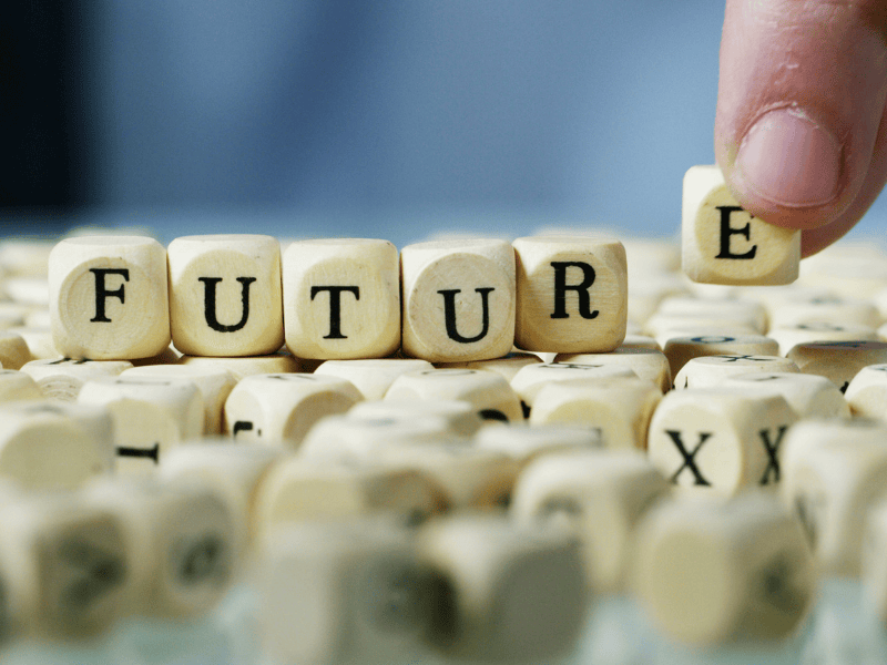 Wooden blocks spelling future – emotional side of money and long-term planning